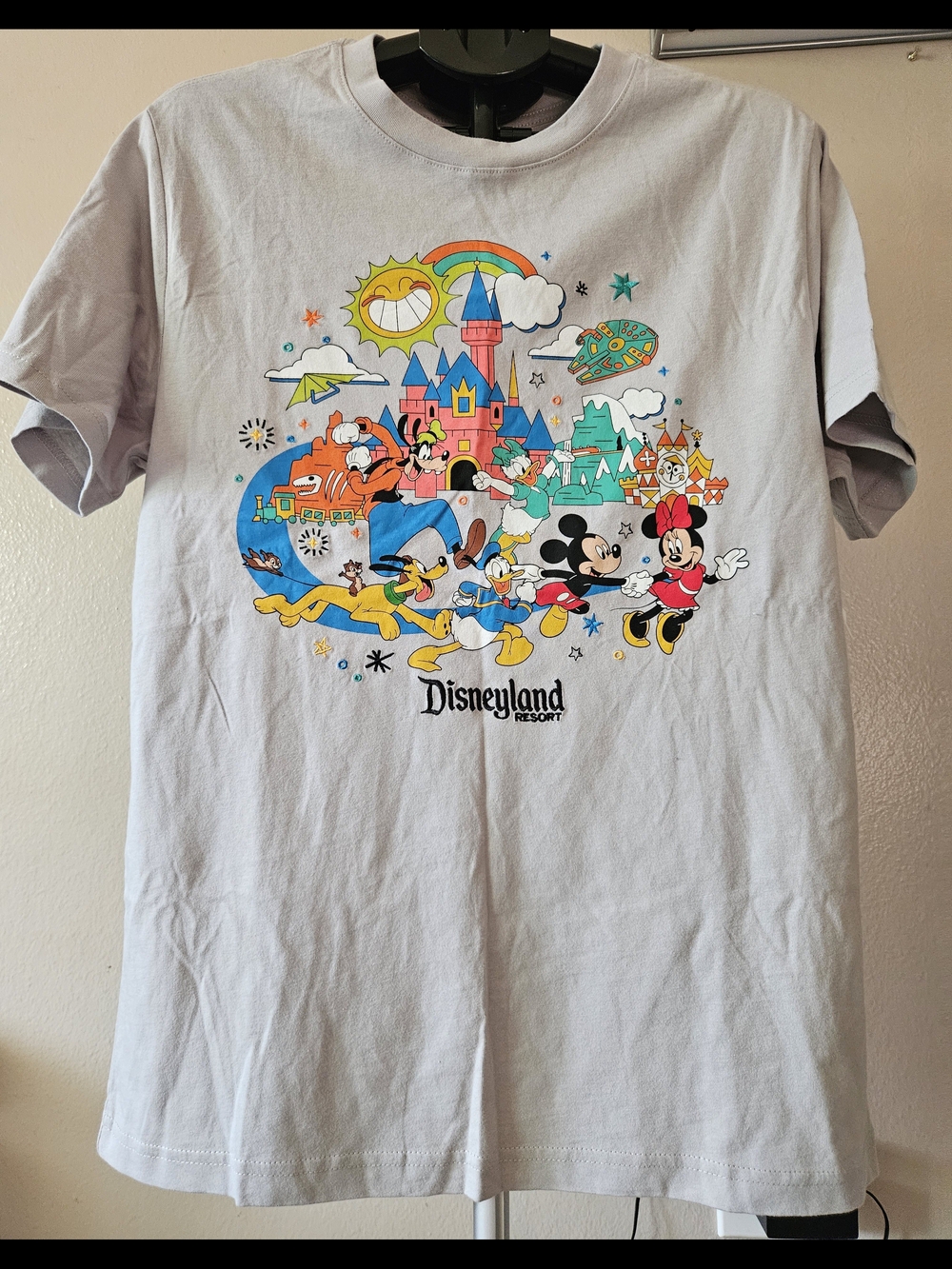 Disneyland Resort character t-shirt features a colorful graphic with Goofy